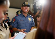 Philippine troops hunt down extremists who beheaded Canadian