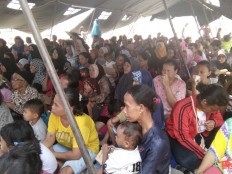 Pasar Ikan evictees live on amid ruins of former homes