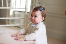 In this undated handout photo released on Sunday, May 1, 2016 by Kensington Palace, Britain's Princess Charlotte poses for a photograph, at Anmer Hall, in Norfolk, England. 