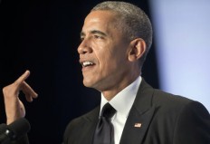 Obama urges Asian-Americans to stand up to bigotry 