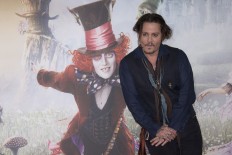 Actor Johnny Depp mocks his 'war on terrier' apology 