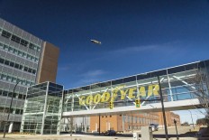 The Goodyear Tire & Rubber Company's newest blimp flies over the company's headquarters during its first flight on March 17, 2014.