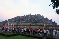 Thousands of worshipers join in the procession to circle Borobudur Temple as part of Pradaksina ritual. JP/Tarko Sudiarno
