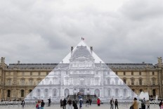 Artist makes Louvre Pyramid disappear in optical illusion 