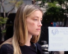 Amber Heard's ex-girlfriend defends actress in past arrest 