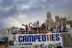  Thousands welcome Madrid back home after European triumph 