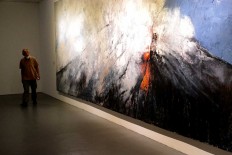 Wedhus Gembel. The painting tells the story of a volcanic eruption that is not only viewed as a geological event, but as a myth that shapes a society’s culture.