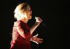Adele calls out fan for filming show instead of watching it 