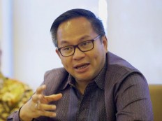 Mandiri cuts growth target as bad loan challenges persist 