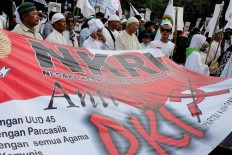 Protestors warn of rising threat of communist ideology