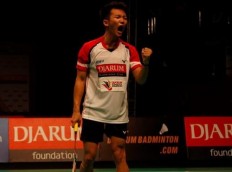 Indonesia's Ihsan gets through quarters in tough battle