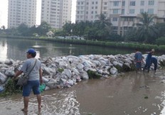 Dozens of houses flooded as dam collapses 