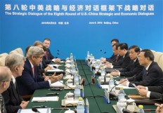 US Secretary of State John Kerry, third left, speaks during a session on across from Chinese State Councilor Yang Jiechi (right) during a Strategic Track small session as part of the US-China Strategic and Economic Dialogues at Diaoyutai State Guesthouse in Beijing Monday.