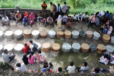 The tradition of Nyadran has become a bonding time for family members and relatives who live outside their home village and city to perform the ritual. The Jakarta Post/ Albertus Magnus Kus Hendratmo