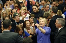 Clinton seeks to cap nomination with wins in California, NJ 