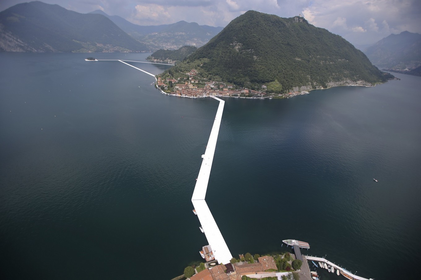 Artist Christo Walks On Water With Floating Piers Destinations The Jakarta Post