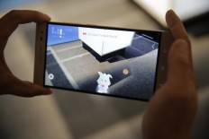  Lenovo, Google unveil phone that knows its way around a room 