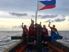 Filipinos, American sail to Scarborough Shoal; harassed by China