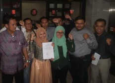 Ahok supporters to request judicial review of revised elections law