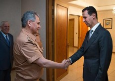 Russia's defense minister visits Syria, meets Assad 