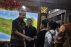 No emergency status yet for C. Java floods, landslides