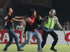 Ahok slams soccer fans for violence and vandalism