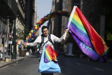  Rainbow flags, images of shooting victims at pride parades 