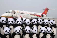 First made-in-China jetliner makes debut commercial flight 