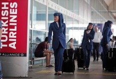 Members of a flight crew arrive at Istanbul's Ataturk airport, Wednesday, June 29, 2016. AP Photo/Lefteris Pitarakis