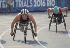 In this Thursday, June 30, 2016, photo, Tatyana McFadden, of Clarksville, Md., races through the first corner of the women's 800-meter run at the U.S. Paralympic trials in Charlotte, N.C. McFadden has won the Boston Marathon wheelchair race four times. In April, she crossed the line first at Boston and then at the London Marathon in the same week. She's competing at the U.S. Paralympic trials through Saturday, a step along the way as she aims to rival the Olympic feats of stars such as Michael Phelps. Jenn Finch/University of Georgia via AP