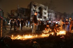 Security ordered tightened as death toll in Baghdad hits 157