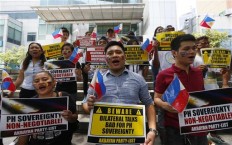 China defiant, Philippines softens as UN court set to rule