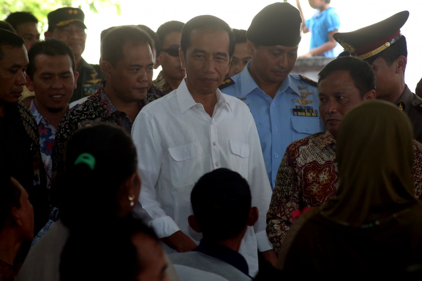 President Jokowi greets residents in Gondangrejo, Karanganyar, Central Java, on Thursday. Jokowi visited his hometown, Surakarta, a day after celebrating the first day of Idul Fitri in Padang, West Java. 