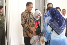 Jokowi takes charge of controversial tax amnesty