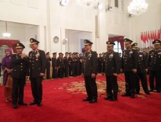 Jokowi swears in new police chief, calls for unity and solidity