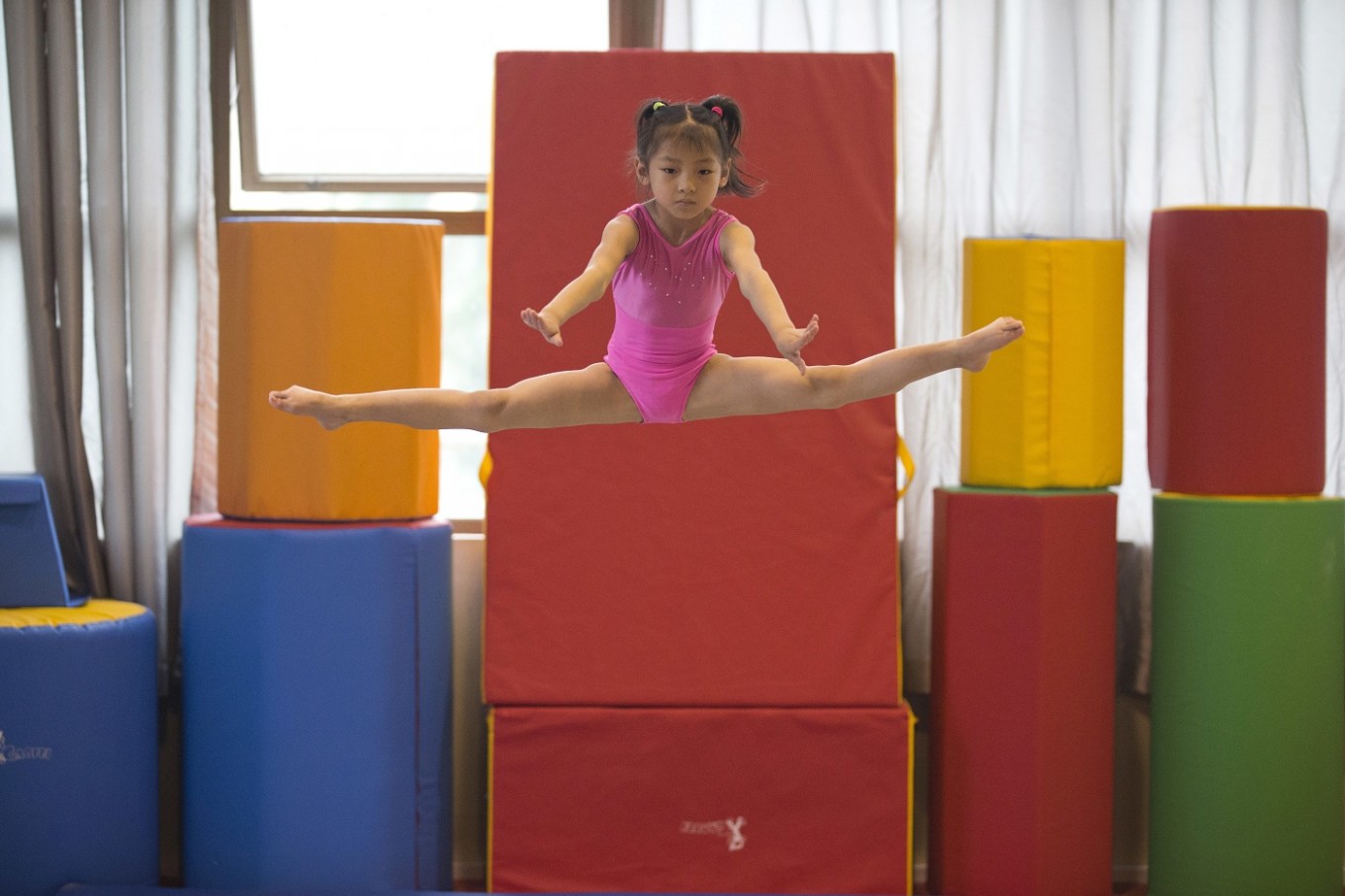 In China, 'Happy Gymnastics' replaces grind of strict study 