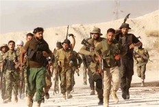 Activists: Airstrikes on IS-held villages in Syria kill 56 