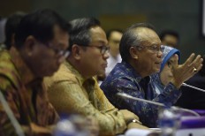 Former Bank Mandiri president director Kartiko Wirjoatmodjo (yellow batik) attends a meeting about the tax amnesty with the House of Representatives Commission XI in Jakarta on July 20, 2020 (20/7). 