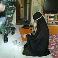 Santoso’s wife surrenders