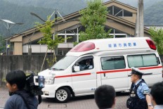 At least 15 killed, dozens injured in knifing near Tokyo 