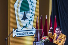 Jokowi demands Golkar’s consistent support