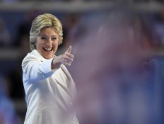 Democratic presidential nominee Hillary Clinton give a thumbs up after taking the stage to make her acceptance speech during the final day of the Democratic National Convention in Philadelphia , Thursday, July 28, 2016. AP Photo/Mark J. Terrill