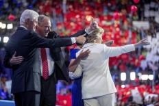 From left, Former President Bill Clinton, left, Democratic vice presidential candidate, Sen. Tim Kaine, D-Va., Tim Kaine's wife Anne Holton, and Democratic presidential candidate Hillary Clinton stand on stage together during the fourth day session of the Democratic National Convention in Philadelphia, Thursday, July 28, 2016. AP Photo/Andrew Harnik