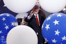Former President Bill Clinton looks at the falling balloons at the conclusion of the Democratic National Convention in Philadelphia , Thursday, July 28, 2016. AP Photo/J. Scott Applewhite