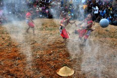 Children perform a dance illustrating the atmosphere during the Mount Merapi explosion in 2010. JP/ Albertus Magnus Kus Hendratmo
