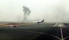 Emirates airliner with 300 onboard crash lands in Dubai