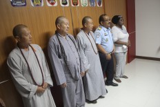 Three Chinese nationals caught begging in Bali