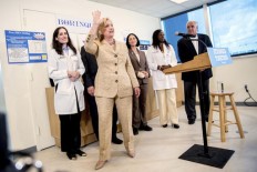 Widening aim, Clinton commits resources to Georgia, Arizona 