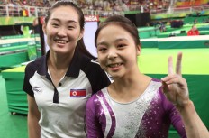 Even Olympic selfies are complicated by Koreas' rivalry 
