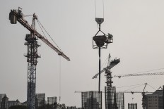 BI predicts economy to grow slightly better in Q3